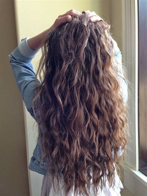 Although not very easy to maintain like the normal long hair, few maintenance tips are needed to give your hair the glamorous look it deserves. Thick hair curls, going to try and do this somehow | Hair styles, Brown wavy hair, Long hair styles