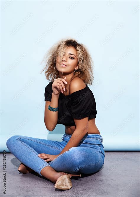 Portrait Of Blissful Sexy Hot Black Woman With Blond African Hairstyle