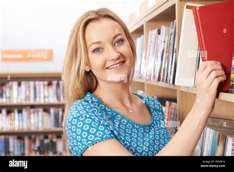 Female Student Studying In Library Stock Photo Alamy