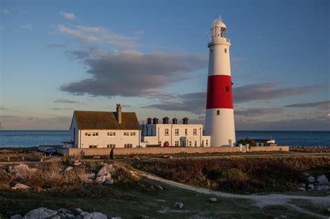 Free Images Lighthouse Tower Beacon Sea Sky Coast Ocean Shore
