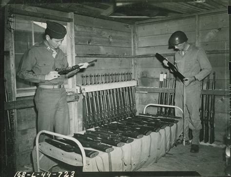 Rifle Inspecting At Training Camp In California On 25 February 1944