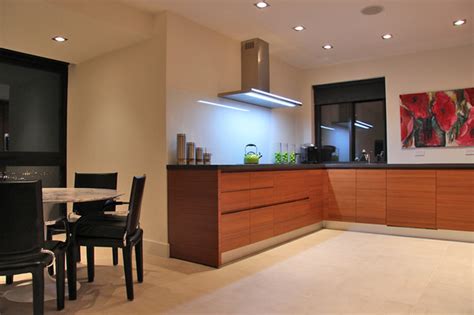 Horizontal grained teak kitchen cabinets for 60s modern beach house in british columbia. Teak Wood Kitchen Cabinets