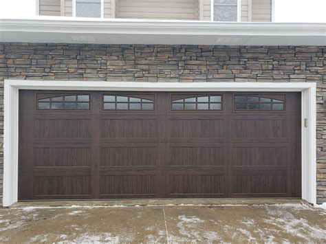 Chi Carriage House Stamped In Walnut Accent Woodtone Residential Installation Door Masters