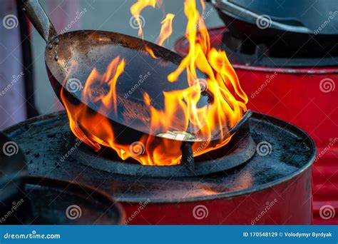 Chef Cooking With Fire In Frying Pan Stock Image Image Of Motion