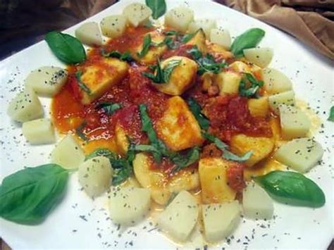 La meilleure recette de Lamelles d encornet à la sauce tomates au vin