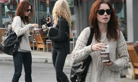 Lily Collins Rocks The Casual Look In Jeans And A Cable Knit Jumper As She Grabs A Coffee With