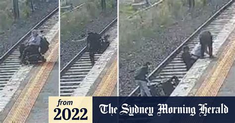 Video Bystanders Rush To Save Man In Wheelchair On Tracks