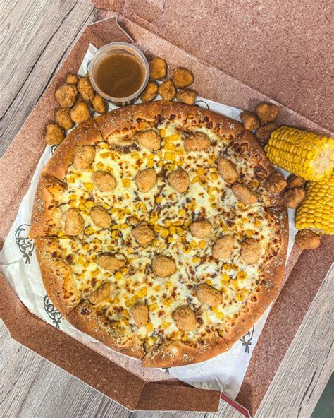 Kfc And Pizza Hut Team Up To Create New Popcorn Chicken Pizza With