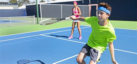 In tennis, one person starts the first serve of the game. Custom Tennis Courts | Renovate or Install Professional Courts