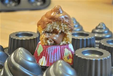 Replace reserved tops, then pipe view image. NordicWare Filled Cupcakes Pan, reviewed - Baking Bites