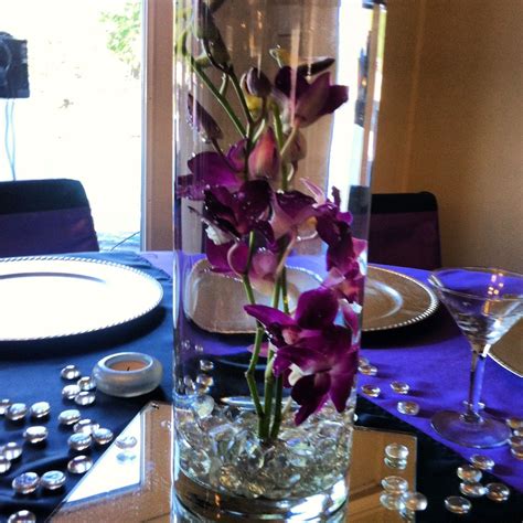 Pin By Maria On Wedding Submerged Orchid Centerpiece Purple Orchids Orchid Centerpieces