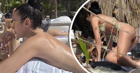 Dua Lipa Flaunts Her Incredible Figure As She Sunbathes Topless And