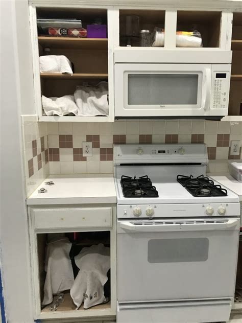 Use sandpaper in the middle of the spectrum (150 or 200 grit is good) and just give all of. How to Paint Cabinets That Have Already Been Painted ...