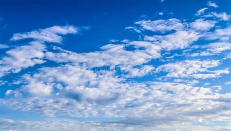 Beautiful White Cloud Formations On A Blue Summer Sky Stock Photo