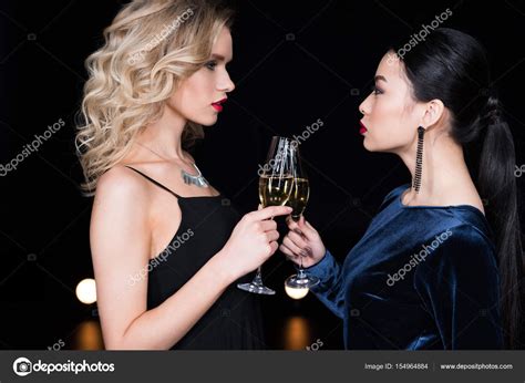 Glamour Women Clinking With Champagne Glasses Stock Photo