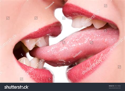 Beautiful Female Lovers Kissing Tongues Out Foto Stock