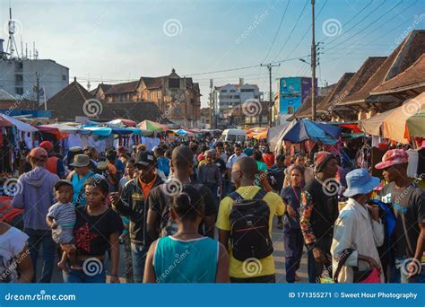 A Crowd Of African People In The Market Antananarivo Street Full Of