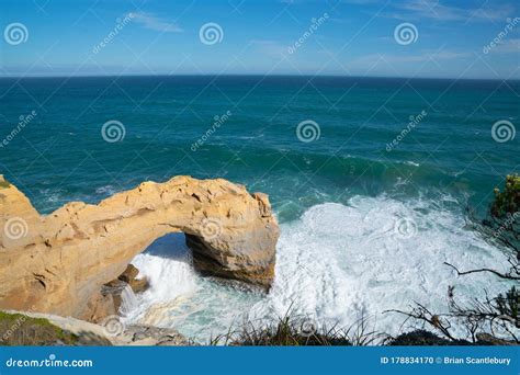 Coastal Natural Arch Viewed From Adjacent Cliffs Stock Photo Image Of