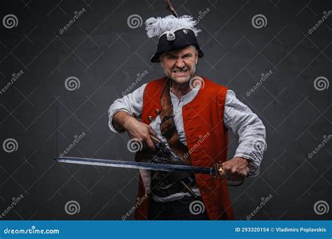 Seasoned Pirate With A Grey Beard Dressed In A Brown Pirate Vest Stock