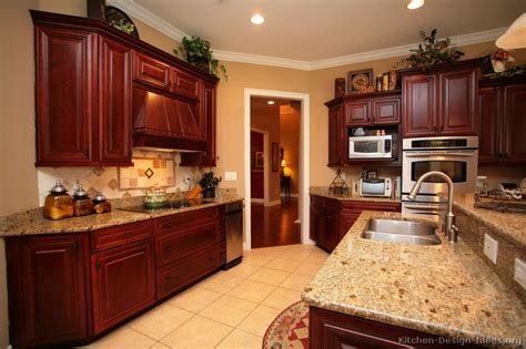 It adds a dramatic flair to anyone who wears it even with just the daintiest hint of sweet reddish hues! Pictures of Kitchens - Traditional - Dark Wood Kitchens ...