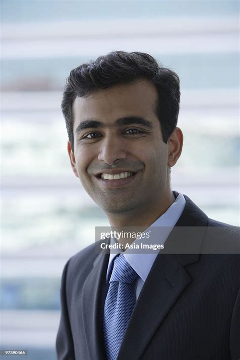 Portrait Of Indian Businessman Smiling High Res Stock Photo Getty Images