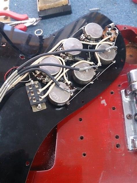 A ground connection connects every piece of metal on your guitar and acts as a return path to the amp. #guitar custom wiring on a Burns