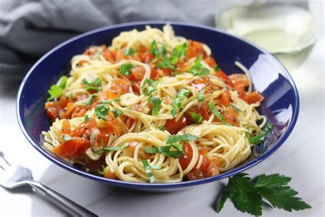 Begin timing the angel hair pasta once the water boils, and turn the heat down so the water simmers. How To Make The Best Simple Angel Hair Pasta- The Fed Up ...