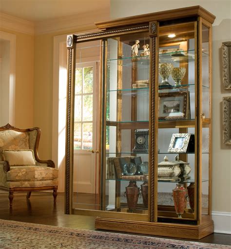 Tertia dark brown and black curio cabinet with glass doors. Estate Oak Two Way Sliding Door Curio from Pulaski (20484 ...