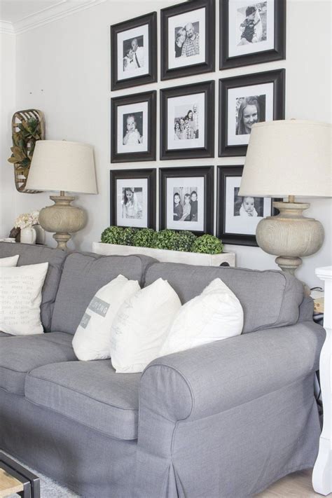 black and white grid gallery wall behind sectional couch # in 2020 ...