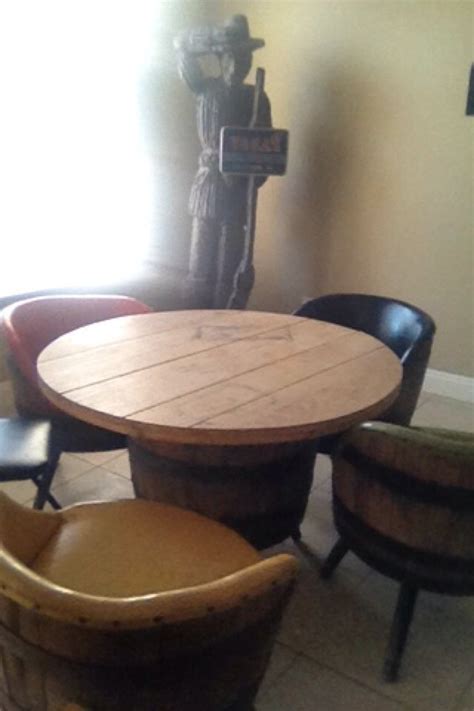 For our end tables we even sort through the hundreds of barrel tops and when available you can choose from your favorite distillery brand. Whiskey barrel chairs and table | Dining table, Barrel ...