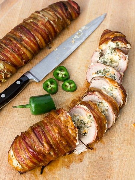 Are you looking for a recipe that brings smiles to the table and sighs of relief after family dinner? Jalapeño Popper Stuffed Smoked Pork Tenderloin Wrapped in ...