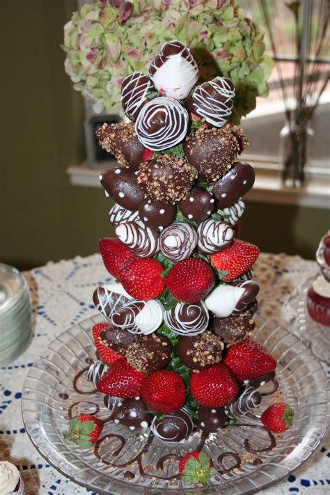 This is the ultimate guide to chocolate covered strawberries. chocolate covered strawberry tower | Christmas chocolate ...