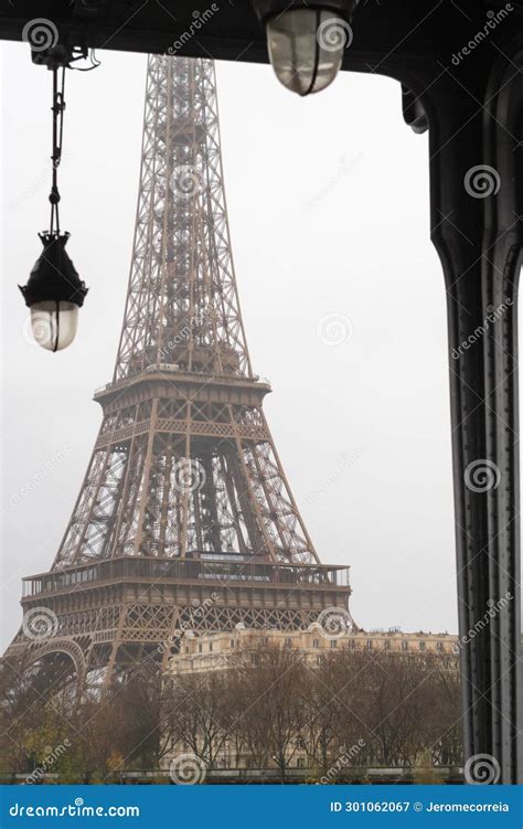 The Eiffel Tower Under The Bir Hakeim Bridge In The Rain In Paris Stock