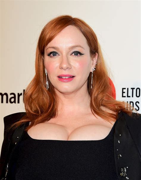 christina hendricks shows off her big boobs at the 28th annual elton john oscar viewing party