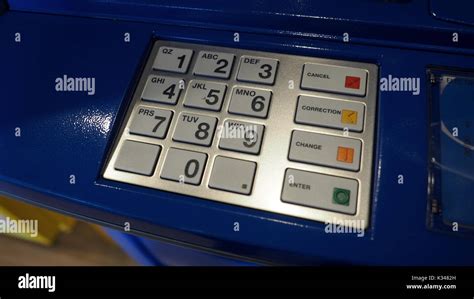 Blue Color Banking Atm Machine And Black Number On White Button Keypad
