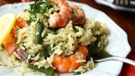 Toss together and serve immediately over steamed rice. Shrimp Scampi Over Rice from Knorr® Recipe - Allrecipes.com