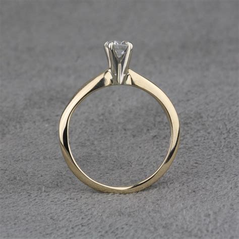 Had an awful experience trying to sell two engagement rings everywhere else. Pre-Owned Diamond Engagement Ring