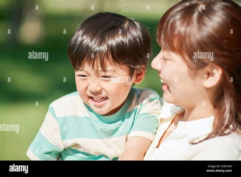 Japanese Mother And Smiling Son Stock Photo Alamy
