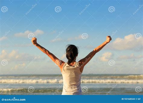 Young Woman Open Arms On Sunrise Seaside Beach Stock Photo Image Of