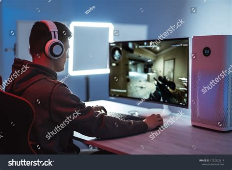 Professional Gamer Playing Online Video Games Stock Photo Edit Now