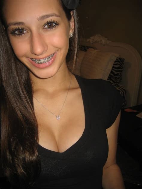 Cute Brunette With Braces And Nice Cleavage