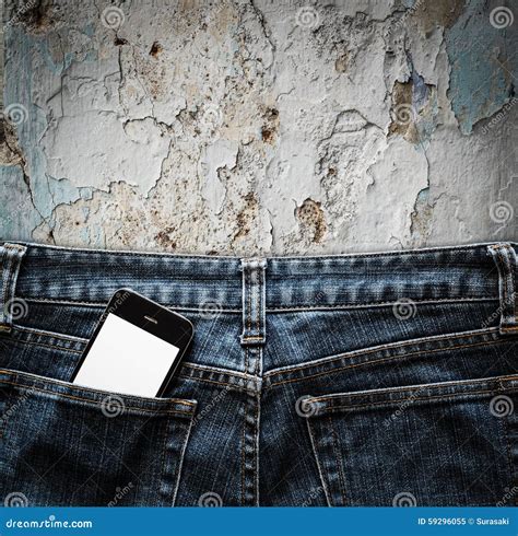 Blue Jeans With Cell Phone In A Pocket Background Stock Image Image