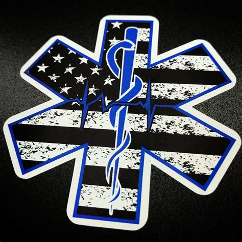 Create an exciting logo free online using our many choices of star logos including a symbol of a star on a suitcase with a plane icon encircling it, a star with palm trees and a swoosh around it and many other. STAR OF LIFE American Flag w Rod of Asclepius Sticker