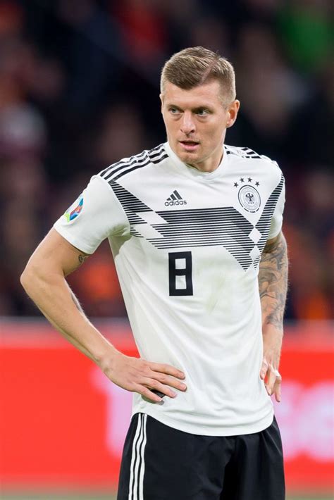 Toni kroos is a midfielder and is 6' and weighs 163 pounds. Toni Kroos of Germany looks on during the 2020 UEFA ...