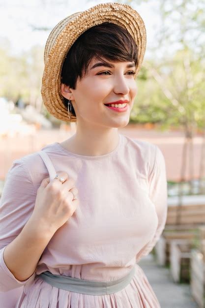 Free Photo Cute Short Haired Girl Dreamy Smiling Looking Away During