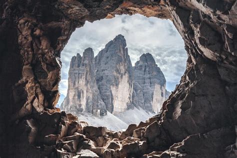 Tre Cime Di Lavaredo Drei Zinnen Views From A Hole In The Rock Of The