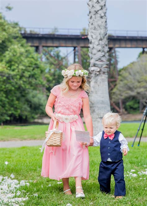 Flower Girl And Ring Bearer In Pink Bow Tie