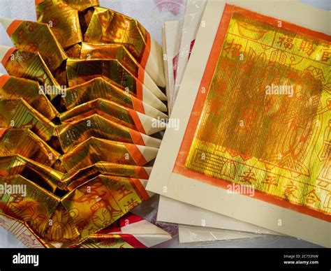 Gold Chinese Joss Paper Aka Ghost Money Spirit Money Or Hell Bank Notes Folded Into The Shape