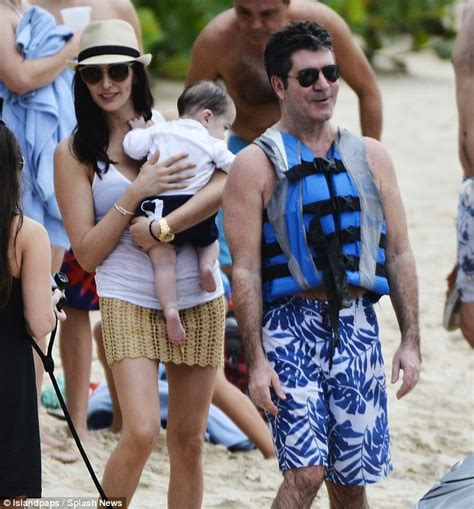 simon cowell with girlfriend lauren silverman in barbados with son eric daily mail online