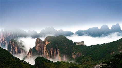 Huangshan Schöne Landschaft Berge Nebel Gebäude Bäume China